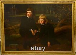 Énorme peinture à l'huile sur toile du XIXe siècle représentant deux enfants et un paysage ancien