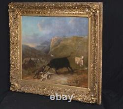 Grand tableau antique à l'huile du 19e siècle représentant un combat entre un taureau et un loup dans un paysage montagneux