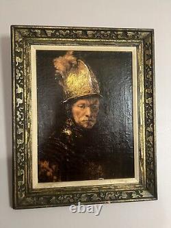 Peinture à l'huile ancienne encadrée dorée de grand format d'un homme avec un casque doré d'après Rembrandt