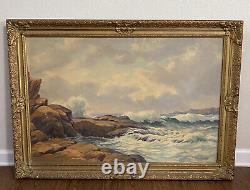 Peinture à l'huile vintage sur toile encadrée signée EW Roberts, plage côtière aux vagues rocheuses