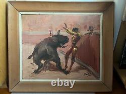 Peinture antique de matador combattant un taureau sur toile encadrée 26 x 30 Mexique 1960 signée